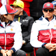 Antonio Giovinazzi (left) and Kimi Raikkonen (right) before the Chinese Grand Prix in April.